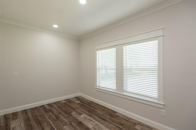 spare room featuring recessed lighting, crown molding, baseboards, and dark wood-style flooring