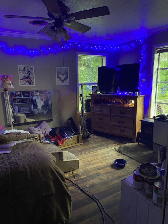 bedroom featuring ceiling fan and hardwood / wood-style floors