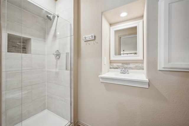 bathroom with a stall shower