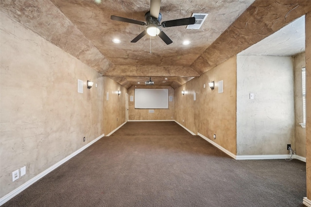 carpeted empty room featuring ceiling fan, baseboards, and visible vents