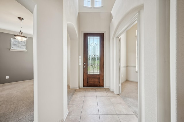 9616 Barksdale Dr, Fort Worth, TX 76244 - entrance foyer featuring light carpet, baseboards, and light tile patterned floors