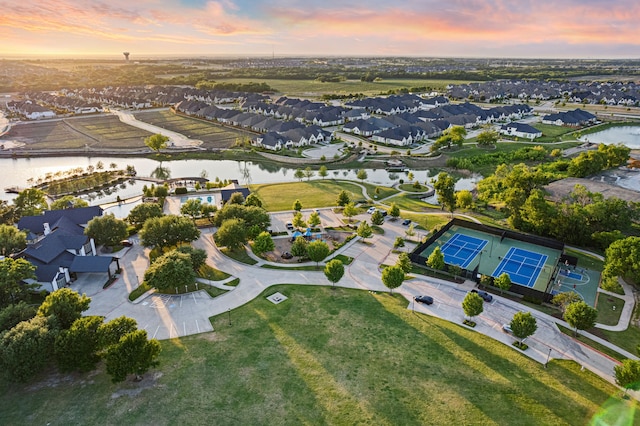 aerial view featuring a water view and a residential view