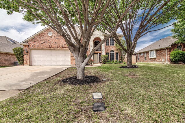 2 Cortina Ct, Mansfield, TX 76063 - traditional home featuring brick siding, driveway, a garage, and a front lawn