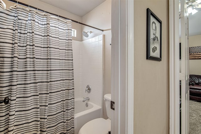 full bathroom with shower / tub combo and toilet