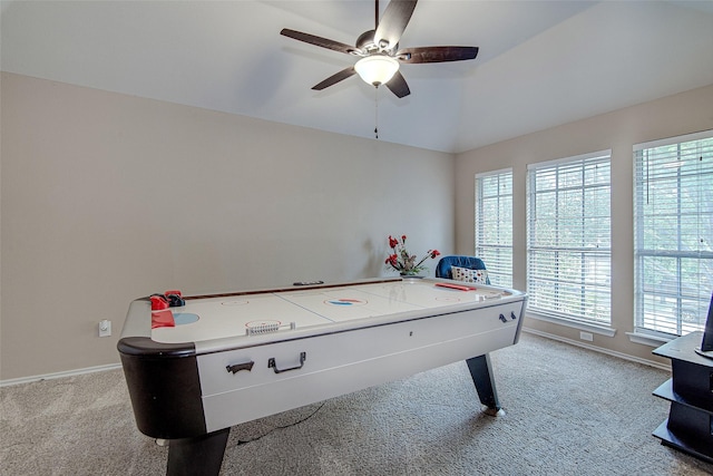 rec room with ceiling fan, baseboards, carpet flooring, and a wealth of natural light