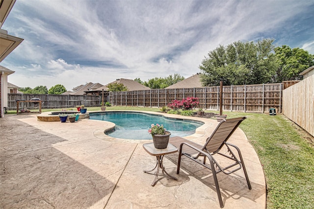 view of pool featuring a fenced backyard, a yard, a patio, and a fenced in pool