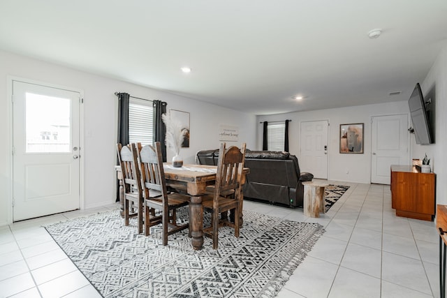 dining space featuring light tile patterned flooring, visible vents, and recessed lighting