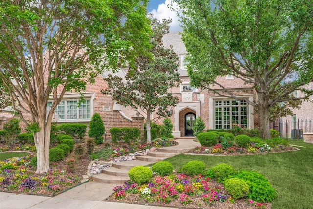 view of front of property with brick siding