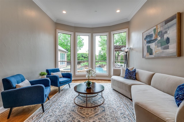 living room with crown molding, wood finished floors, and recessed lighting