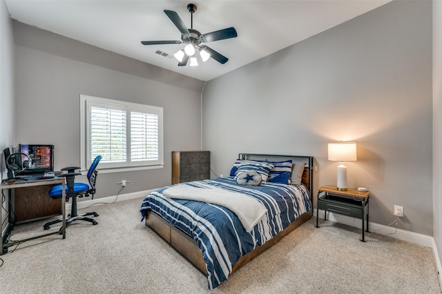 bedroom with visible vents, carpet flooring, baseboards, and ceiling fan