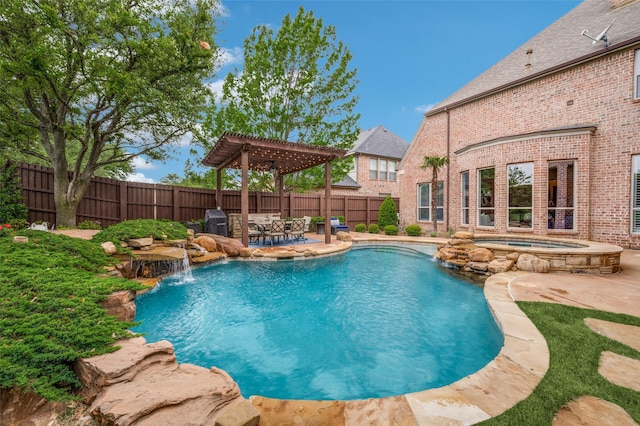 view of swimming pool with a pergola, a pool with connected hot tub, a patio, and a fenced backyard