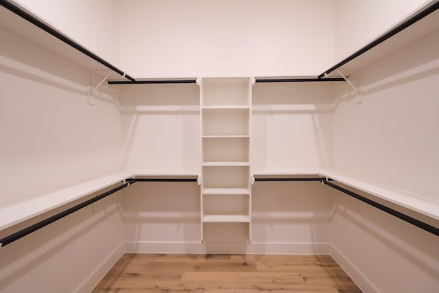 spacious closet with light wood finished floors
