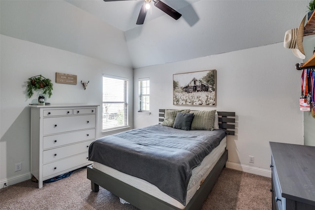 bedroom featuring carpet, lofted ceiling, baseboards, and ceiling fan