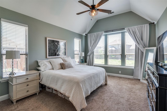bedroom with light colored carpet, vaulted ceiling, visible vents, and baseboards