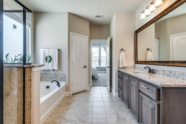 4416 Juniper Ln, Melissa, TX 75454 - ensuite bathroom with a bath, vanity, tile patterned floors, and baseboards