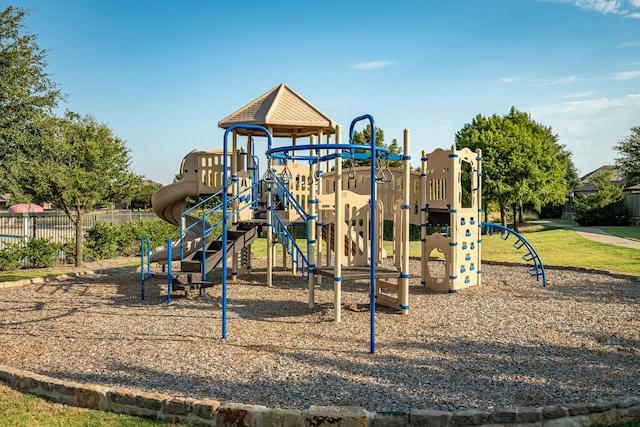community jungle gym with fence