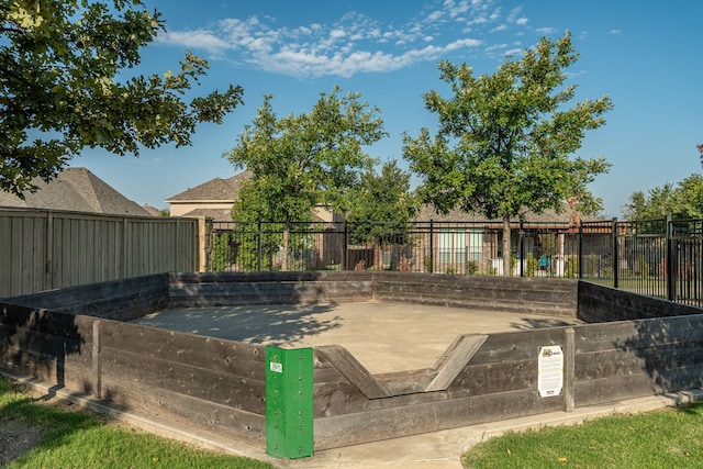 surrounding community with a fenced backyard