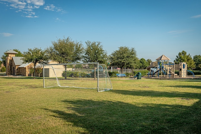 view of yard featuring playground community