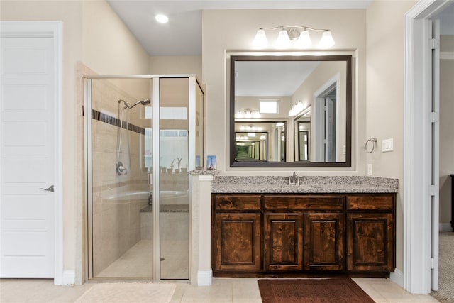 13043 Seattle Slew St, Frisco, TX 75035 - bathroom featuring vanity, a stall shower, tile patterned floors, and baseboards