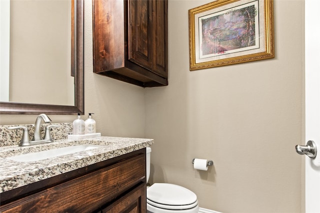 13043 Seattle Slew St, Frisco, TX 75035 - bathroom featuring vanity, toilet, and baseboards