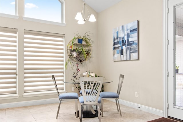 13043 Seattle Slew St, Frisco, TX 75035 - tiled dining area featuring baseboards and a chandelier