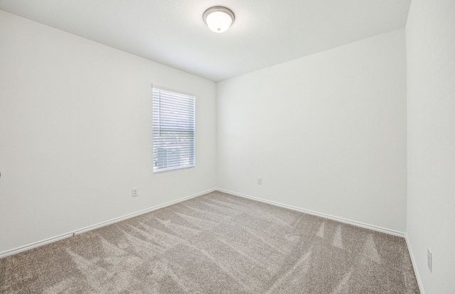 1055 Clear Dusk Ln, Forney, TX 75126 - carpeted spare room featuring baseboards
