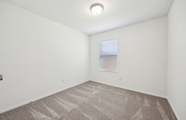 1055 Clear Dusk Ln, Forney, TX 75126 - carpeted spare room with baseboards