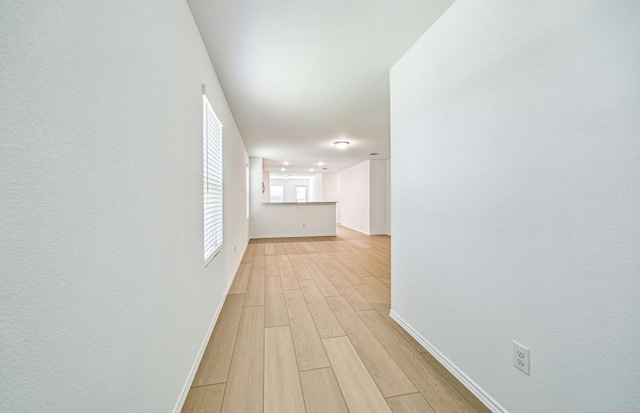 1055 Clear Dusk Ln, Forney, TX 75126 - corridor featuring light wood-type flooring and baseboards