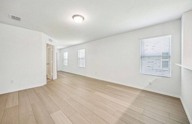1055 Clear Dusk Ln, Forney, TX 75126 - empty room featuring light wood-type flooring and baseboards