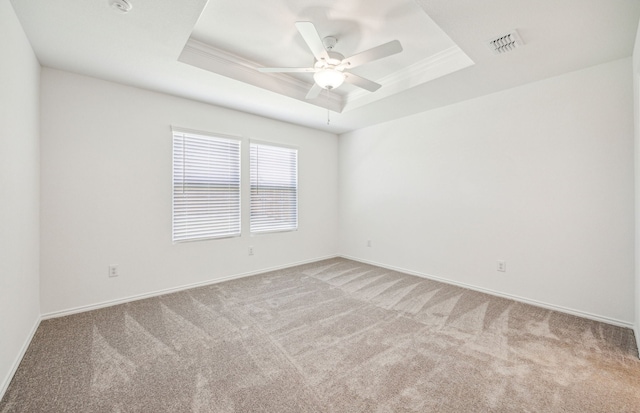 1055 Clear Dusk Ln, Forney, TX 75126 - unfurnished room with carpet flooring, a tray ceiling, ceiling fan, baseboards, and ornamental molding
