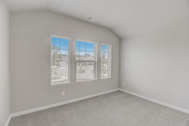 610 Willet Dr, Mckinney, TX 75069 - empty room with carpet, visible vents, baseboards, and lofted ceiling