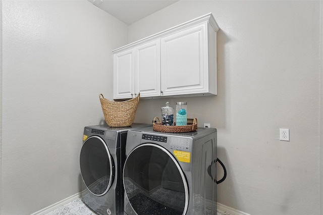 1102 Belvedere Dr, Allen, TX 75013 - laundry area featuring washer and dryer, baseboards, and cabinet space