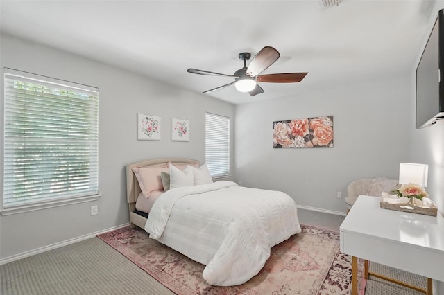 1102 Belvedere Dr, Allen, TX 75013 - carpeted bedroom featuring a ceiling fan, baseboards, and multiple windows