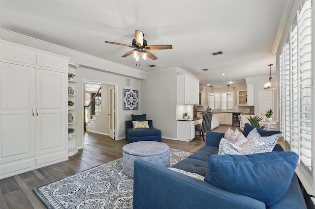 1102 Belvedere Dr, Allen, TX 75013 - living area with stairway, ceiling fan, dark wood-style flooring, and visible vents