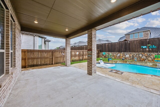 view of patio with a fenced backyard