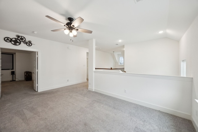 unfurnished room with carpet floors, a ceiling fan, baseboards, and recessed lighting