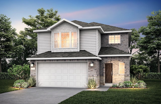 view of front facade with a front lawn, driveway, stone siding, a shingled roof, and a garage