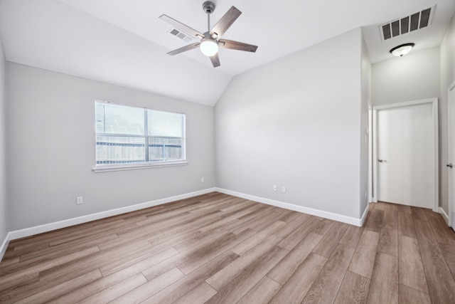 unfurnished room featuring ceiling fan, baseboards, visible vents, and light wood-type flooring