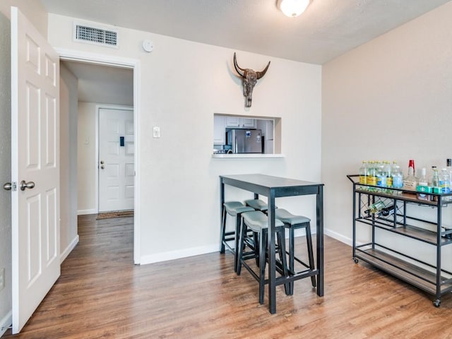 4539 N O Connor Rd Unit 2234, Irving, TX 75062 - dining room with wood finished floors and baseboards