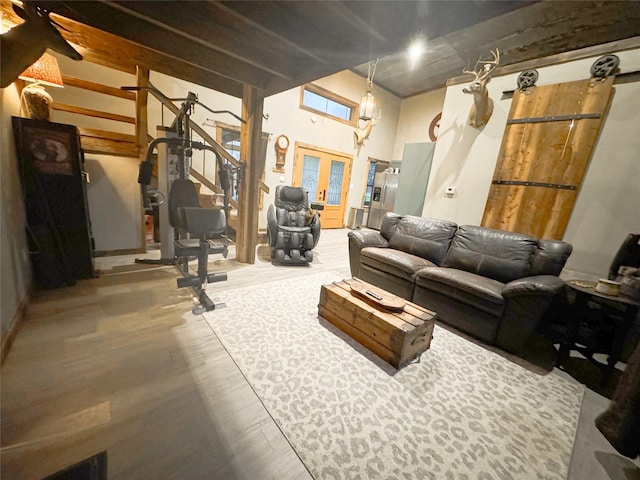 living room featuring baseboards and wood finished floors