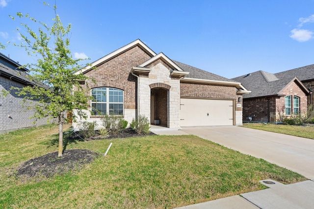 view of front facade with concrete driveway, an attached garage, stone siding, and a front yard