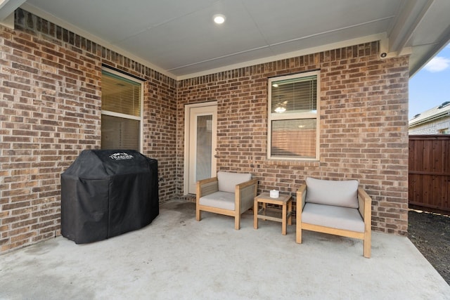 view of patio / terrace featuring fence and area for grilling