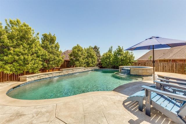 560 Southwestern Dr, Rockwall, TX 75087 - view of pool with a fenced backyard, a pool with connected hot tub, and a patio area