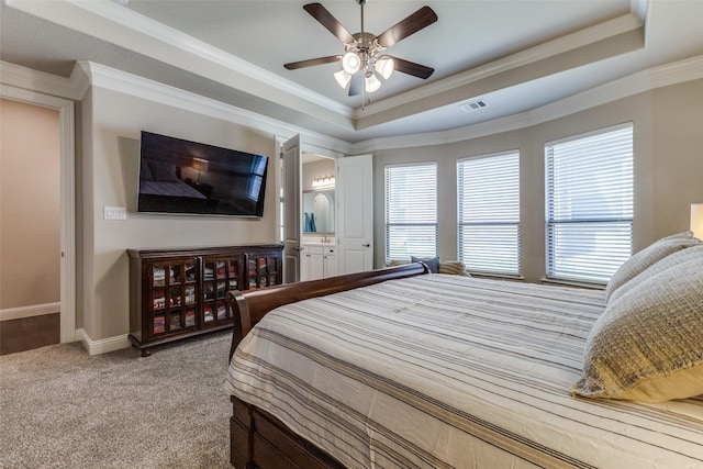 560 Southwestern Dr, Rockwall, TX 75087 - bedroom featuring a raised ceiling, light carpet, crown molding, baseboards, and ensuite bathroom
