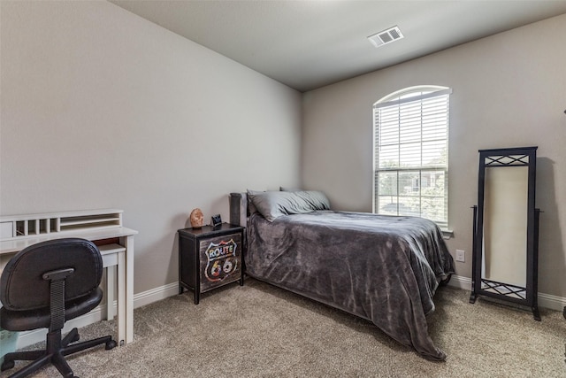 560 Southwestern Dr, Rockwall, TX 75087 - bedroom with light colored carpet, baseboards, and an office area