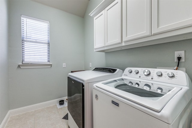 560 Southwestern Dr, Rockwall, TX 75087 - washroom with independent washer and dryer, cabinet space, baseboards, and light tile patterned floors