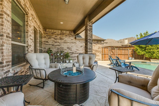 560 Southwestern Dr, Rockwall, TX 75087 - view of patio with an outdoor hangout area and fence