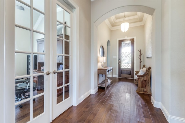 560 Southwestern Dr, Rockwall, TX 75087 - entryway featuring arched walkways, french doors, crown molding, dark wood-style floors, and baseboards