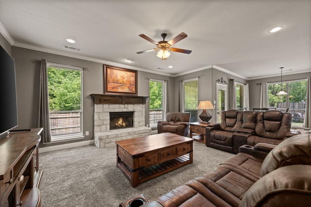 carpeted living room featuring a fireplace, a ceiling fan, visible vents, and recessed lighting