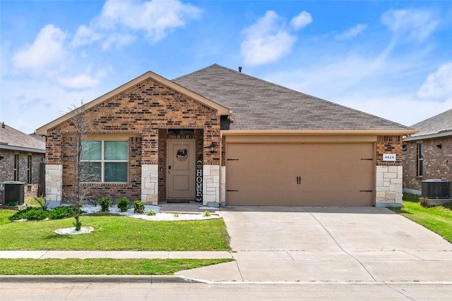 4629 Fringetree Way, Fort Worth, TX 76036 - view of front facade with brick siding, an attached garage, and central AC unit